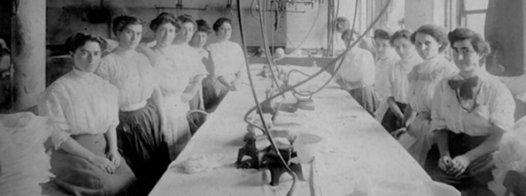 Black and White photo of women factory workers. Ghostly women of Greenwich Village explores their stories.